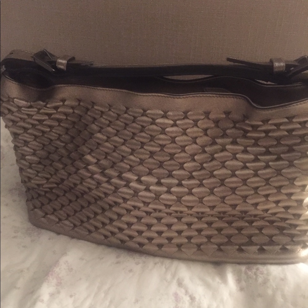 Burberrys metallic bronce bag .. gentile used